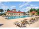 Inviting community pool surrounded by lounge chairs, perfect for relaxation and outdoor fun at 898 Bluffview Dr., Myrtle Beach, SC 29579