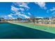 Well-maintained putting green, lake, and the surrounding neighborhood in a relaxing community at 909 Witherbee Way, Little River, SC 29566