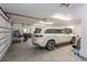 This well-lit three car garage offers plenty of room for cars, toys and storage at 9200 Bellasera Circle, Myrtle Beach, SC 29579