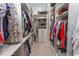 Spacious walk-in closet with custom shelving, hanging rods, and ample storage for clothes and accessories at 9200 Bellasera Circle, Myrtle Beach, SC 29579