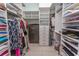 Walk in closet offers an abundance of storage and contains a safe at 9200 Bellasera Circle, Myrtle Beach, SC 29579