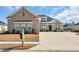 Attractive home with a well-maintained lawn and a long driveway at 931 Henry James Dr., Myrtle Beach, SC 29579