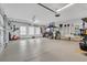 Spacious garage with organized storage, epoxy flooring, and space for multiple vehicles at 931 Henry James Dr., Myrtle Beach, SC 29579