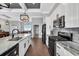 Modern kitchen featuring stainless steel appliances, marble countertops, and an open concept design at 931 Henry James Dr., Myrtle Beach, SC 29579