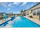 Inviting pool area with sun loungers and picturesque views for ultimate relaxation at 931 Henry James Dr., Myrtle Beach, SC 29579