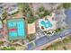 Aerial view showcases a community pool, tennis courts, and beach volleyball, enhancing the lifestyle at 9750 Leyland Dr. # 2, Myrtle Beach, SC 29572