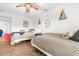 Cozy bedroom featuring two beds, nautical decor, and wood flooring at 9750 Leyland Dr. # 2, Myrtle Beach, SC 29572