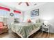 Inviting bedroom with natural light, TV, and comfortable bed at 9750 Leyland Dr. # 2, Myrtle Beach, SC 29572