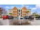 Exterior view of a multi-story building showcasing parking and landscaping at 9750 Leyland Dr. # 2, Myrtle Beach, SC 29572