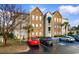 Exterior view of a multi-story building with parking and manicured landscaping at 9750 Leyland Dr. # 2, Myrtle Beach, SC 29572