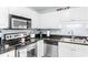 Bright kitchen featuring stainless steel appliances and dark stone countertops at 9750 Leyland Dr. # 2, Myrtle Beach, SC 29572