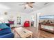 Cozy living room with wood floors, ample seating, and access to the patio at 9750 Leyland Dr. # 2, Myrtle Beach, SC 29572