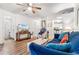 Open living room with wood floors, coastal accents, and easy access to kitchen at 9750 Leyland Dr. # 2, Myrtle Beach, SC 29572
