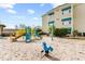 Community playground with slide and climbing structure, perfect for active to enjoy at 9750 Leyland Dr. # 2, Myrtle Beach, SC 29572