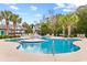 Community pool features a central fountain and ample lounge seating for relaxation at 9750 Leyland Dr. # 2, Myrtle Beach, SC 29572