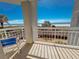 Lovely balcony with stunning ocean views and a relaxing rocking chair at 9820 Queensway Blvd. # 109, Myrtle Beach, SC 29572