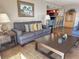 Comfortable living room featuring nice furniture and tile flooring at 9820 Queensway Blvd. # 109, Myrtle Beach, SC 29572