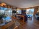 Open living space boasts an eat-in kitchen and sliding doors with beach views at 9820 Queensway Blvd. # 109, Myrtle Beach, SC 29572