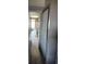 Hallway view leading from bedroom and bath to the kitchen and ocean view balcony at 1501 S Ocean Blvd. S # 1041, Myrtle Beach, SC 29577