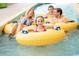 Gathering enjoying a waterpark attraction in inflatable tubes at 1501 S Ocean Blvd. S # 1041, Myrtle Beach, SC 29577
