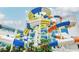 Exciting waterpark featuring towering slides with vibrant colors and tropical foliage at S Ocean Blvd. S # 1041, Myrtle Beach, SC 29577