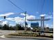 Street view of the Meadows Edge community entrance and signage on a clear, sunny day at 1011 Oak Meadow Dr., Conway, SC 29526