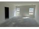Bedroom featuring natural light from two windows and an open doorway at 1013 Jase Dr., Longs, SC 29568