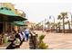 Lively boardwalk with outdoor dining and pedestrian traffic near the beach at 1013 Jase Dr., Longs, SC 29568
