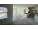 Spacious kitchen layout with white cabinets awaiting installation, offering potential for a dream culinary space at 1013 Jase Dr., Longs, SC 29568