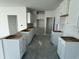 Unfinished kitchen showcasing white cabinetry, ample counter space, and design potential for modern living at 1013 Jase Dr., Longs, SC 29568