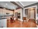 Well-lit kitchen with stainless steel appliances, white cabinets, and hardwood floors at 1045 Means Circle, Myrtle Beach, SC 29577