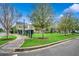 Community street view of the green space and colorful homes at 1045 Means Circle, Myrtle Beach, SC 29577