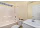 Neat bathroom with a tub-shower combo, white vanity, and ample lighting at 105 Sebring Ln., Myrtle Beach, SC 29588