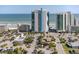 An aerial view of the Oceans One Resort overlooking the beach and ocean at 107 S Ocean Blvd. # 1706, Myrtle Beach, SC 29577