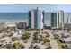 Aerial view showcasing the Oceans One Resort with panoramic views of the ocean and Myrtle Beach coastline at 107 S Ocean Blvd. # 1706, Myrtle Beach, SC 29577