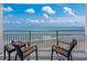 Balcony with seating overlooking the beach and ocean at 107 S Ocean Blvd. # 1706, Myrtle Beach, SC 29577