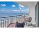 Balcony with ocean view, featuring seating and a metal railing at 107 S Ocean Blvd. # 1706, Myrtle Beach, SC 29577