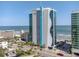 Beautiful exterior of modern condo building overlooking the beach and ocean at 107 S Ocean Blvd. # 1706, Myrtle Beach, SC 29577