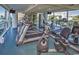 Well-equipped gym with treadmills and elliptical machines with large windows and natural light at 107 S Ocean Blvd. # 1706, Myrtle Beach, SC 29577