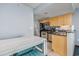Bright kitchen with stainless steel appliances and adjacent breakfast nook, perfect for casual dining and entertaining at 107 S Ocean Blvd. # 1706, Myrtle Beach, SC 29577