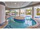 Beautiful lazy river with tile accent and views of the resort and tropical landscaping at 107 S Ocean Blvd. # 1706, Myrtle Beach, SC 29577