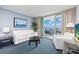 Bright living room with ocean view balcony, comfortable seating, and tasteful decor, perfect for relaxing at 107 S Ocean Blvd. # 1706, Myrtle Beach, SC 29577