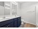 Stylish bathroom with double sink vanity, modern fixtures, and a separate toilet area at 119 Old Chimney Ln, Conway, SC 29526