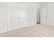 Bright bedroom featuring plush carpet and a double door closet with an adjoining room at 119 Old Chimney Ln, Conway, SC 29526