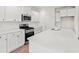 Kitchen features white cabinets, quartz counters, and stainless steel appliances at 127 Old Chimney Ln, Conway, SC 29526