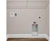 Neat laundry area, featuring white trim at 130 Palm Dr., Loris, SC 29569