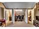 Bonus room with a desk in a closet in the center, with two rooms with beds on both sides at 1539 Old Town Ave., Georgetown, SC 29440