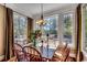Elegant dining room with a chandelier and lots of natural light at 1539 Old Town Ave., Georgetown, SC 29440
