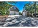 Spacious two-car garage with an extended driveway and a matching storage shed at 1539 Old Town Ave., Georgetown, SC 29440