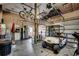 Organized garage interior featuring a golf cart, bicycle, and ample storage solutions at 1539 Old Town Ave., Georgetown, SC 29440